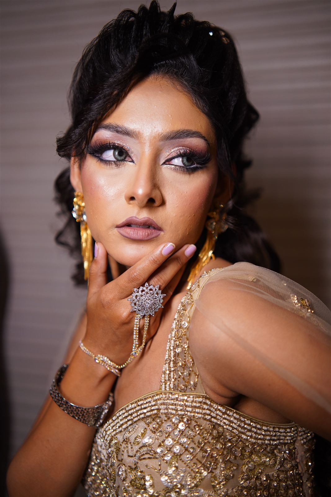 Bridal look in a gold gown from the seminar showcase